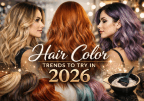 Three women with blonde, copper, and lavender hair showcasing 2026 hair color trends in a modern salon setting